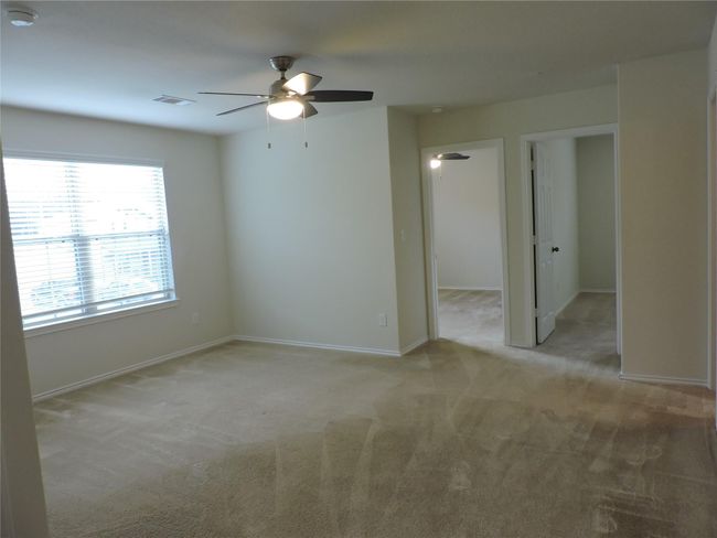 you enter the game room or second living area surrounded by secondary bedrooms | Image 24