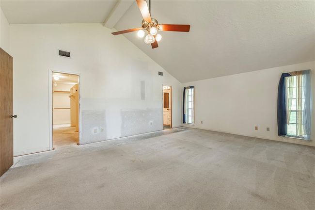 The second and larger primary in the main house with ensuite bath and large walk in closet | Image 18
