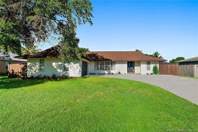 138 Nw Friar Street, House other with 4 bedrooms, 2 bathrooms and 2 parking in Port Saint Lucie FL | Image 1