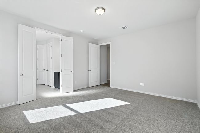 Unfurnished bedroom featuring carpet floors and baseboards | Image 14
