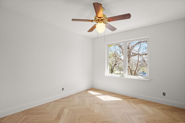 Empty room with baseboards and a ceiling fan | Image 31