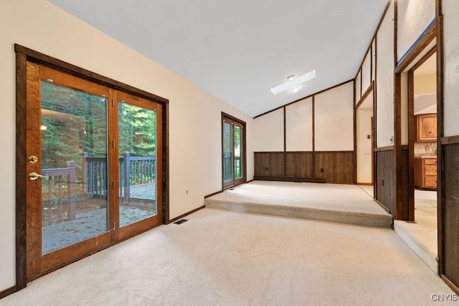Just off the kitchen/dining room is a second living room! | Image 16