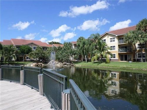 203-8781 Wiles Rd, Coral Springs, FL, 33067-1882 | Card Image