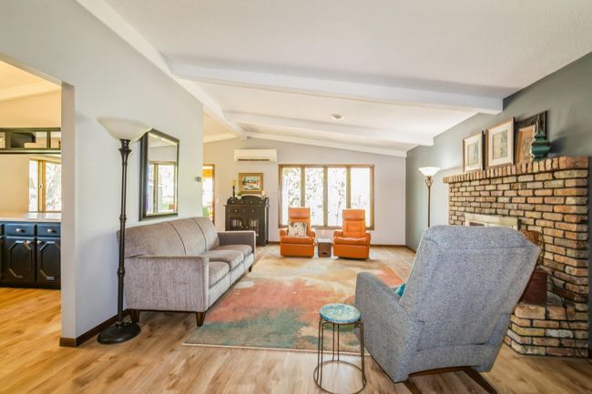 Newer flooring throughout the main level. | Image 11