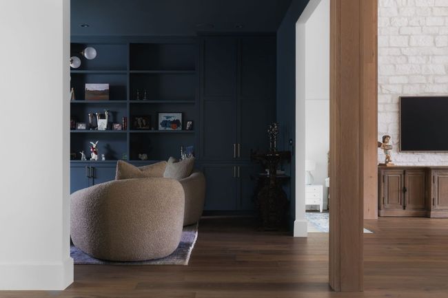Living area with dark wood-style flooring | Image 9