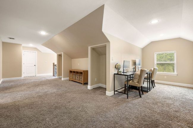 Spacious landing/flex room at the top of the stairs. | Image 23