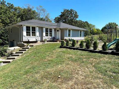 Single story home with a front yard | Image 1