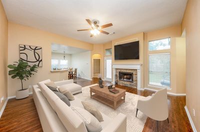 Huge Family Room with Laminate Wood Floors and a Fireplace Too! | Image 2