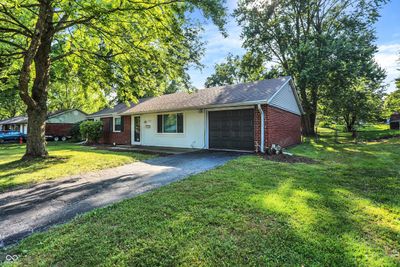 single car attached drywalled garage | Image 3