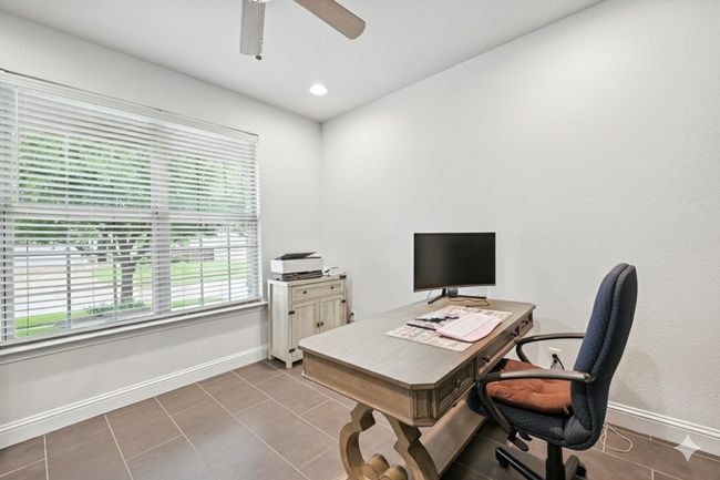 Office space featuring tile patterned flooring, recessed lighting, and a ceiling fan | Image 5