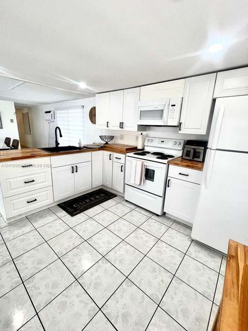 219-219 W Lake Dr, Hallandale, FL, 33009-6010 | Card Image