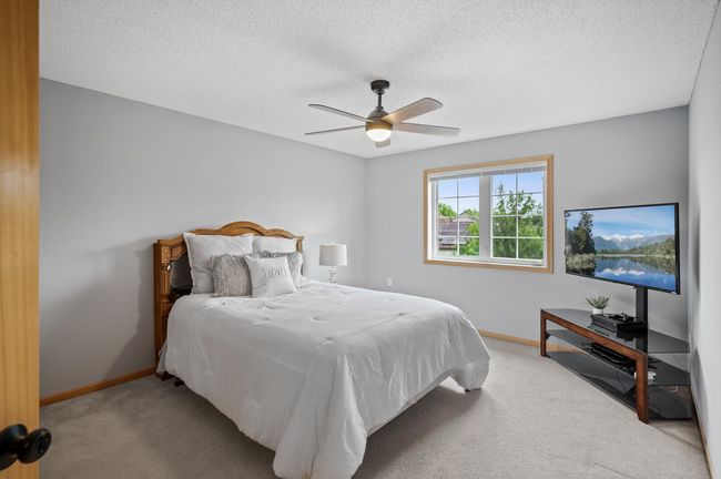 4th bedroom on the upper level overlooks the front yard. | Image 26