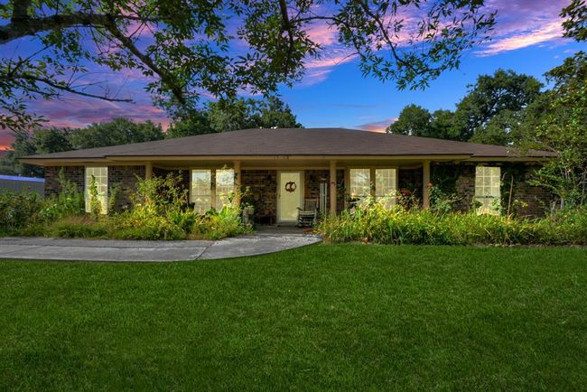Welcome Home! Fabulous 1 story home located in the City limits of Anahuac and across the street from Fort Anahuac Park. | Image 1