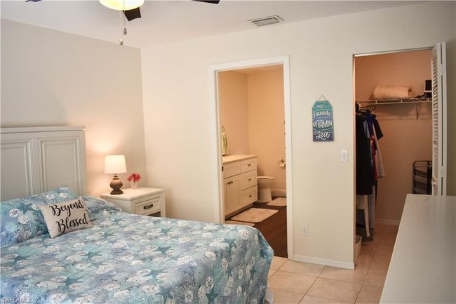Ensuite with bathroom and large walk-in closet | Image 9