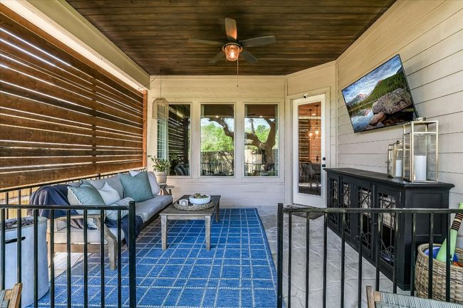 View of patio / terrace featuring ceiling fan and an outdoor hangout area | Image 27