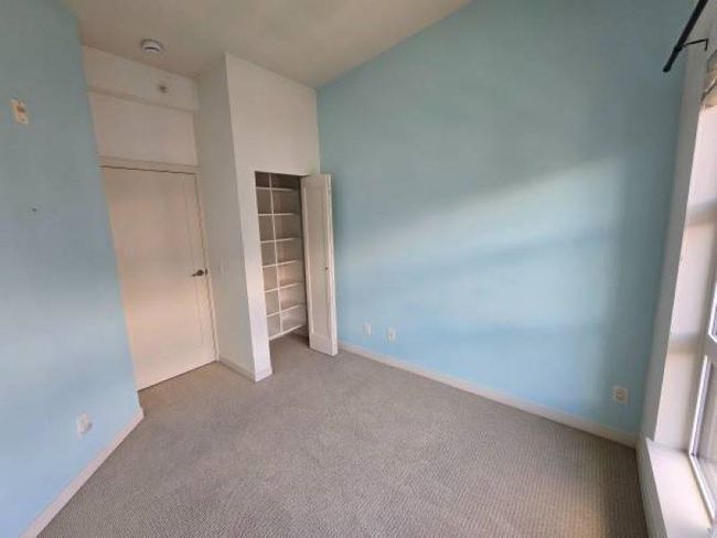 Unfurnished bedroom with carpet floors and baseboards | Image 18