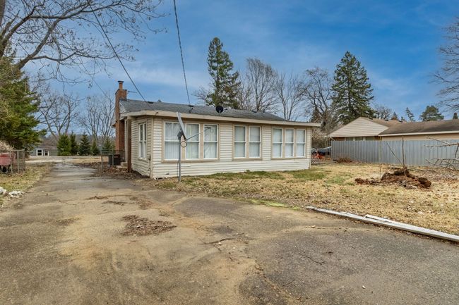 Backyard View, Paved Driveway, Sunroom, Windows | Image 24