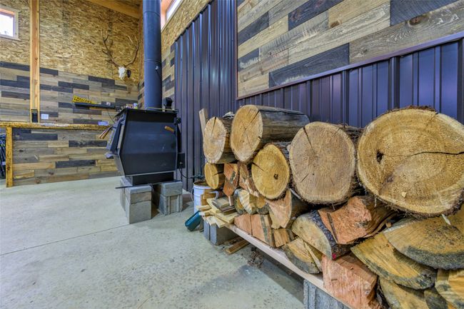 interior of shop with wood stove | Image 45