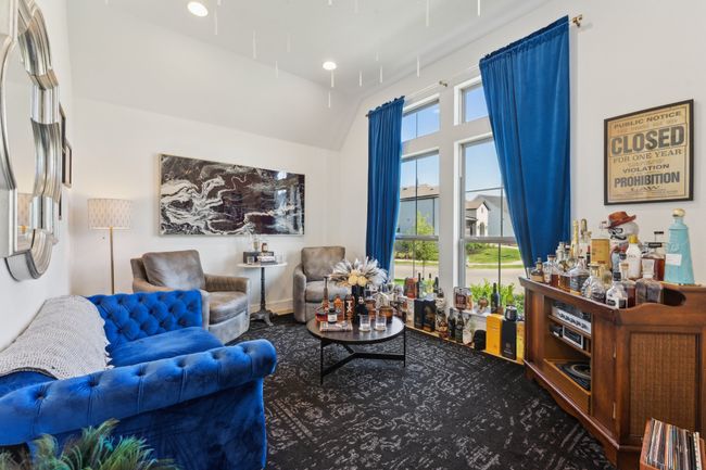 Living room with high vaulted ceiling | Image 15