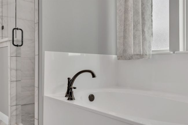 Full bath with a garden tub and a stall shower | Image 23