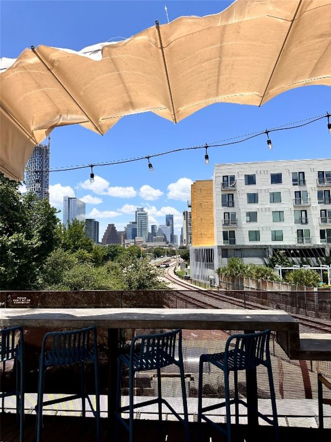 Balcony featuring a view of skyline | Image 7
