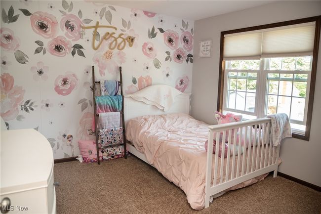 Bedroom featuring carpet and baseboards | Image 36