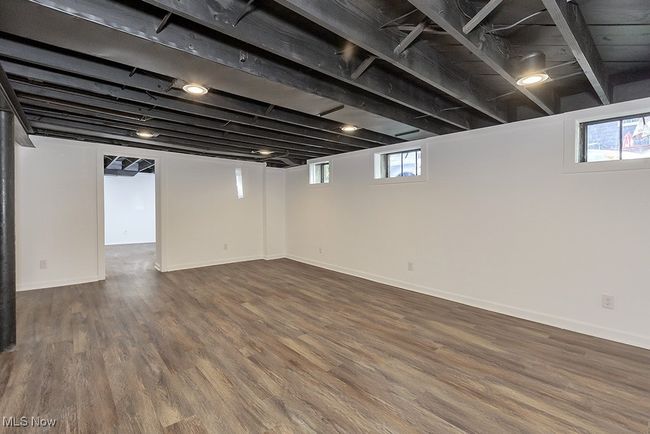 Basement with hardwood / wood-style flooring | Image 41