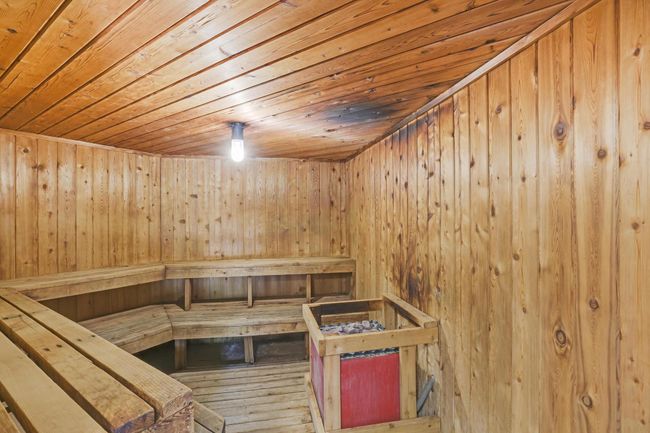 The pool club features two restrooms and a sauna. | Image 16