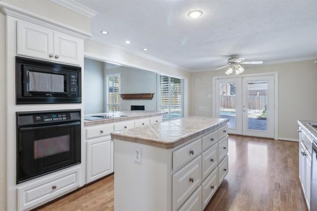 So much storage. Breakfast room with view of pool area. | Image 13