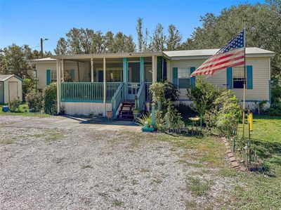 9045 Burr Drive, House other with 4 bedrooms, 2 bathrooms and null parking in Polk City FL | Image 1