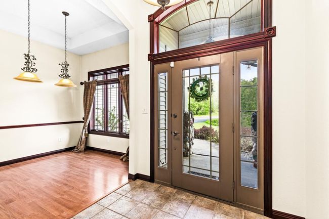Inviting Entry with tiled floor opens to the Formal Dining Room. | Image 4
