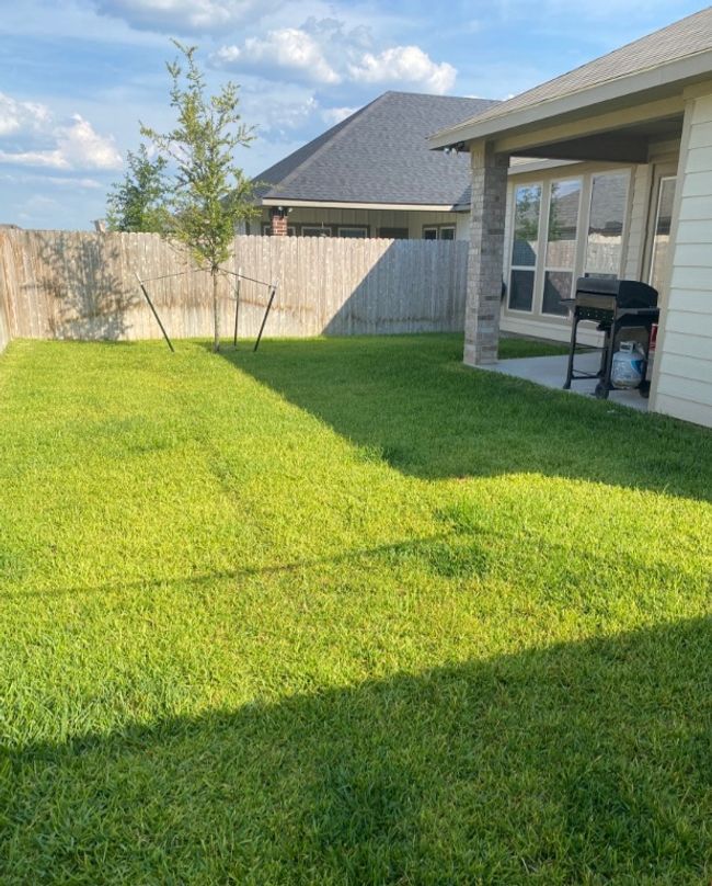 View of yard featuring a patio area and fence | Image 24