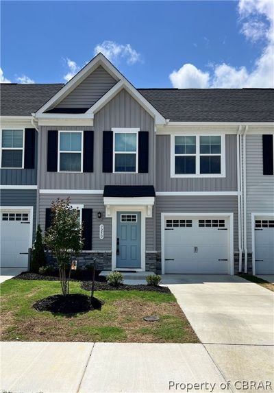 View of front of home with a garage | Image 1