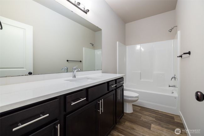 Upstairs main bath. | Image 16