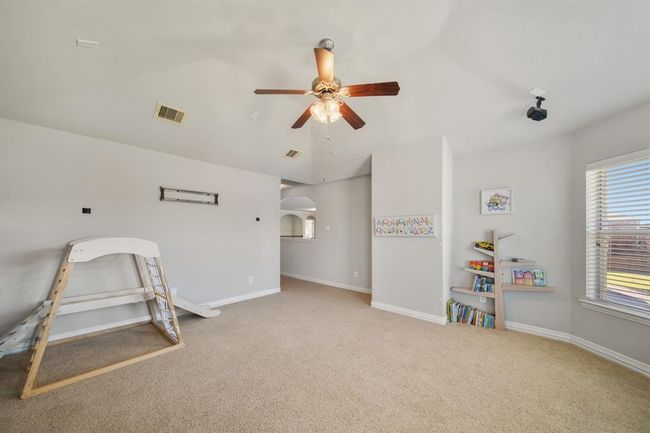 This flexible space could serve as a second floor living area, media room, child's play space etc... | Image 29