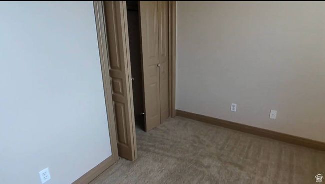Empty room featuring light carpet and baseboards | Image 66