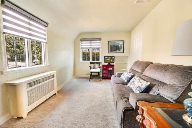 Bedroom 4 that is currently acting as a bonus room. | Image 17