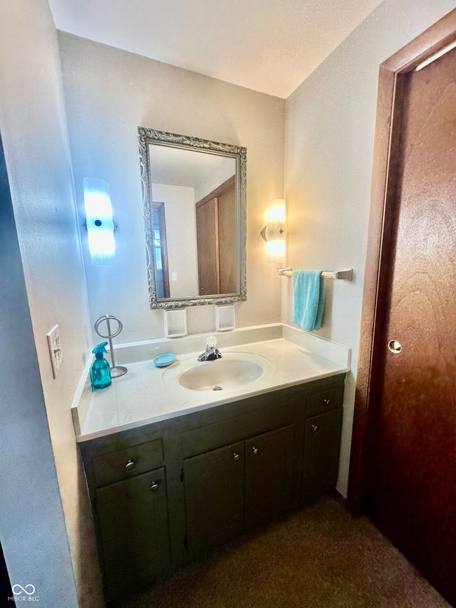 bathroom with vanity | Image 24
