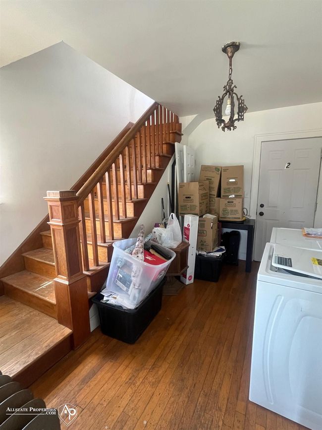 There is an inside and outside entry for the upper level unit in the house. | Image 9