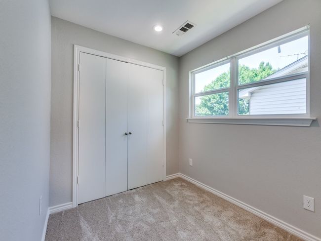 Unfurnished bedroom with carpet floors, baseboards, a closet, and recessed lighting | Image 21