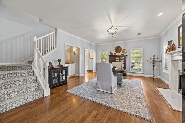 Formal Living Space with Fireplace and Dry Bar | Image 7