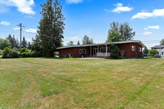 Back of house with a yard | Image 7
