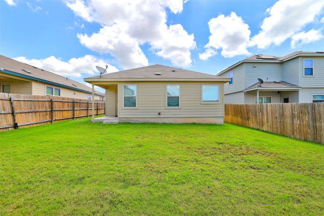 Back of property with a fenced backyard | Image 32
