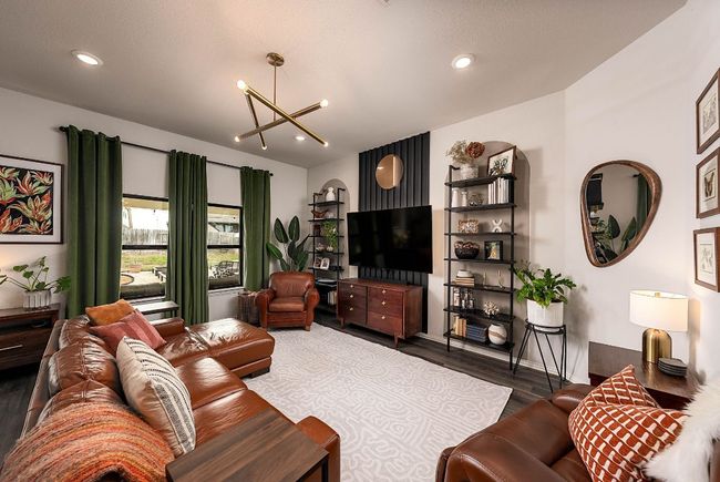 Living area featuring dark wood-type flooring, recessed lighting, and an inviting chandelier | Image 6