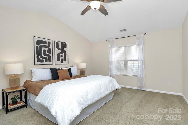 Large primary bedroom suite with gorgeous vaulted ceilings, facing private woods - new carpet & fresh paint! | Image 17