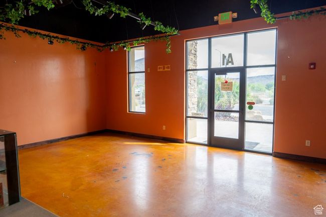 Spare room with concrete floors and baseboards | Image 21