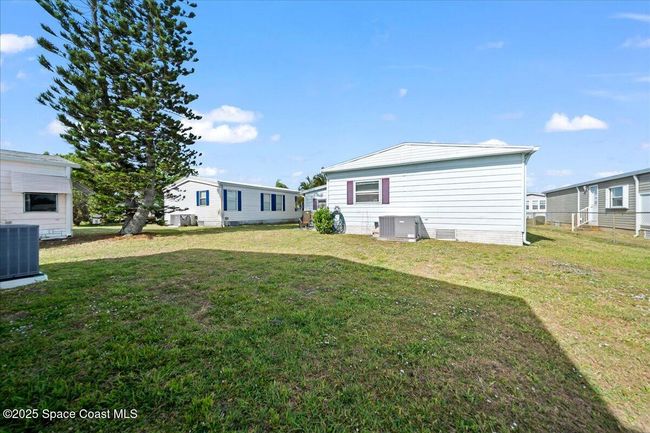 641 Hyacinth Cir, House other with 2 bedrooms, 2 bathrooms and null parking in Barefoot Bay FL | Image 21