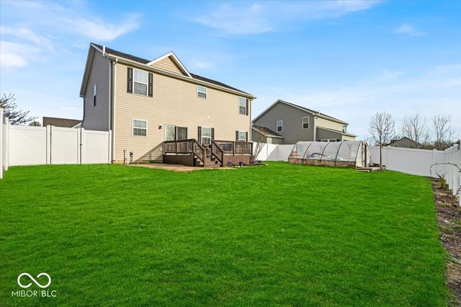 Enjoy privacy in your fully fenced backyard (new vinyl fence). Relax on the deck and enjoy the view! | Image 34