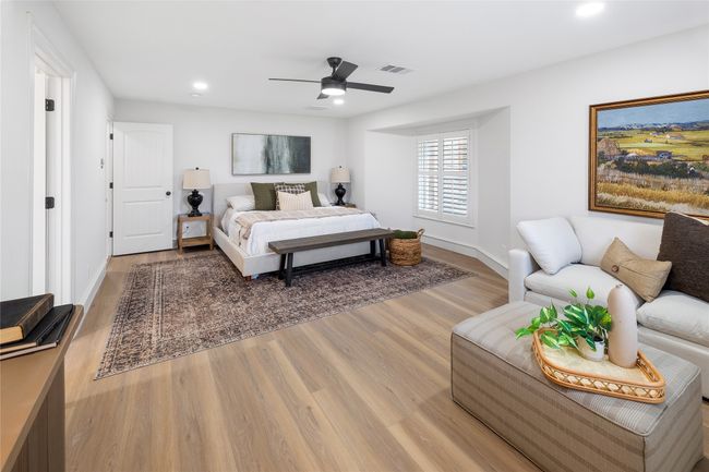 Bedroom featuring wood finished floors, recessed lighting, and a ceiling fan | Image 28