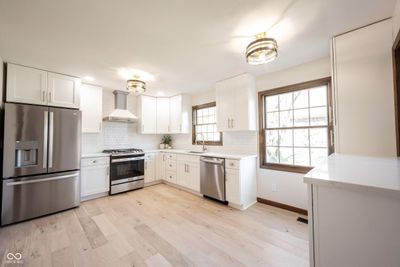 New kitchen cabinets and quartz countertops. | Image 3